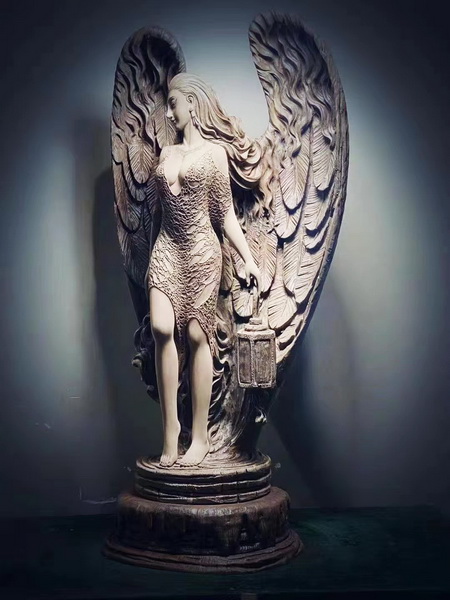 1744620851983323.jpg 刘孝樟木雕作品《天使之翼》.jpg